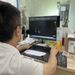 AiFeng Tech engineer using AutoCAD for precision screen protector design and OEM customization