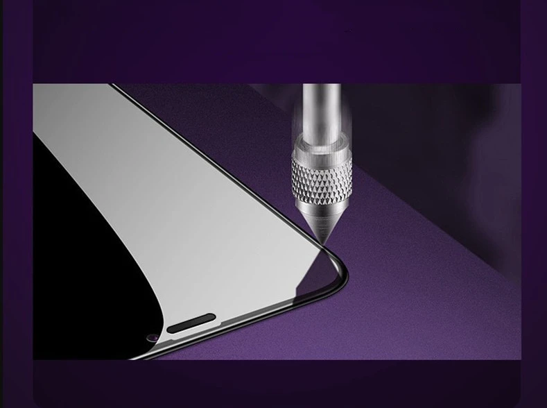 A metal probe applying pressure to the curved edge of a phone tempered glass screen protector for an edge strength test.
